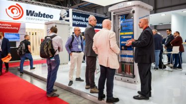 exhibitors at a stand